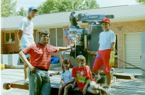 The Burns family posing with a new lathe.